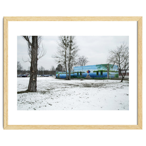 Colorful barn in the snowy ground landscape