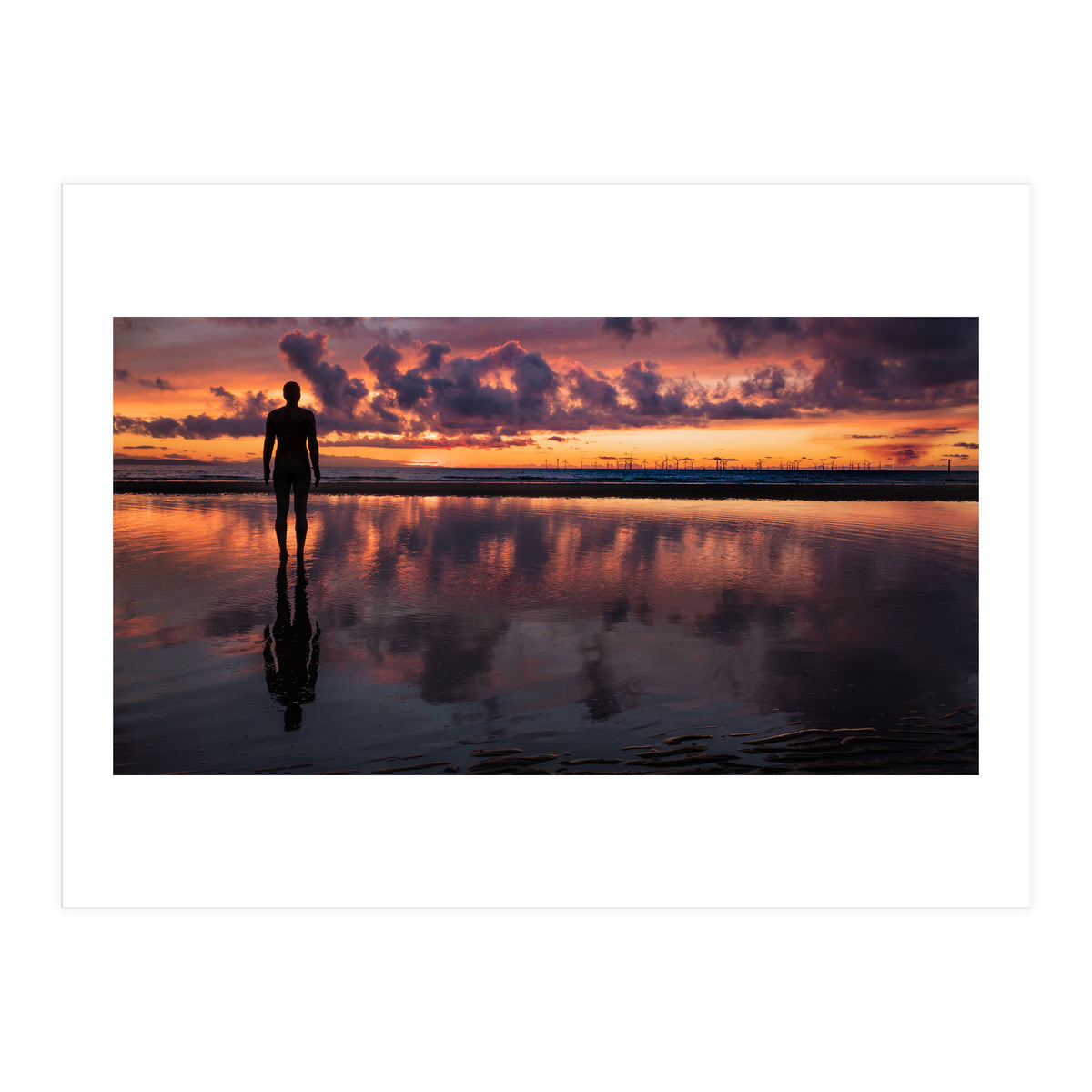 Sunset at Another Place - Sir Antony Gormley statues at Crosby Beach in Merseyside, England. (Print Only)