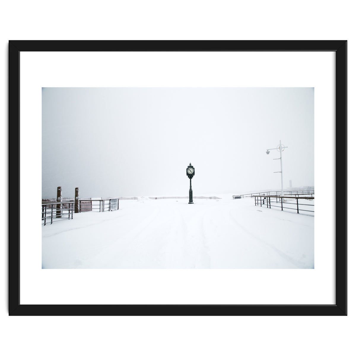 A clock tower in the snow beach