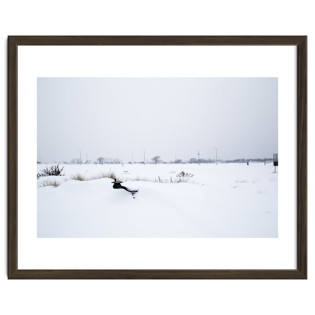 Drinking fountain covered with snow
