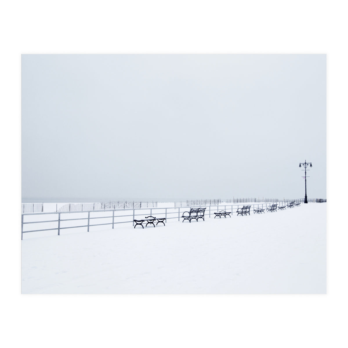 Benches along the pier on snow beach (Print Only)