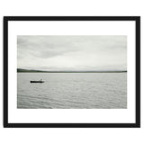 A boy pedaling the Board on the Lake - Iceland thumbnail