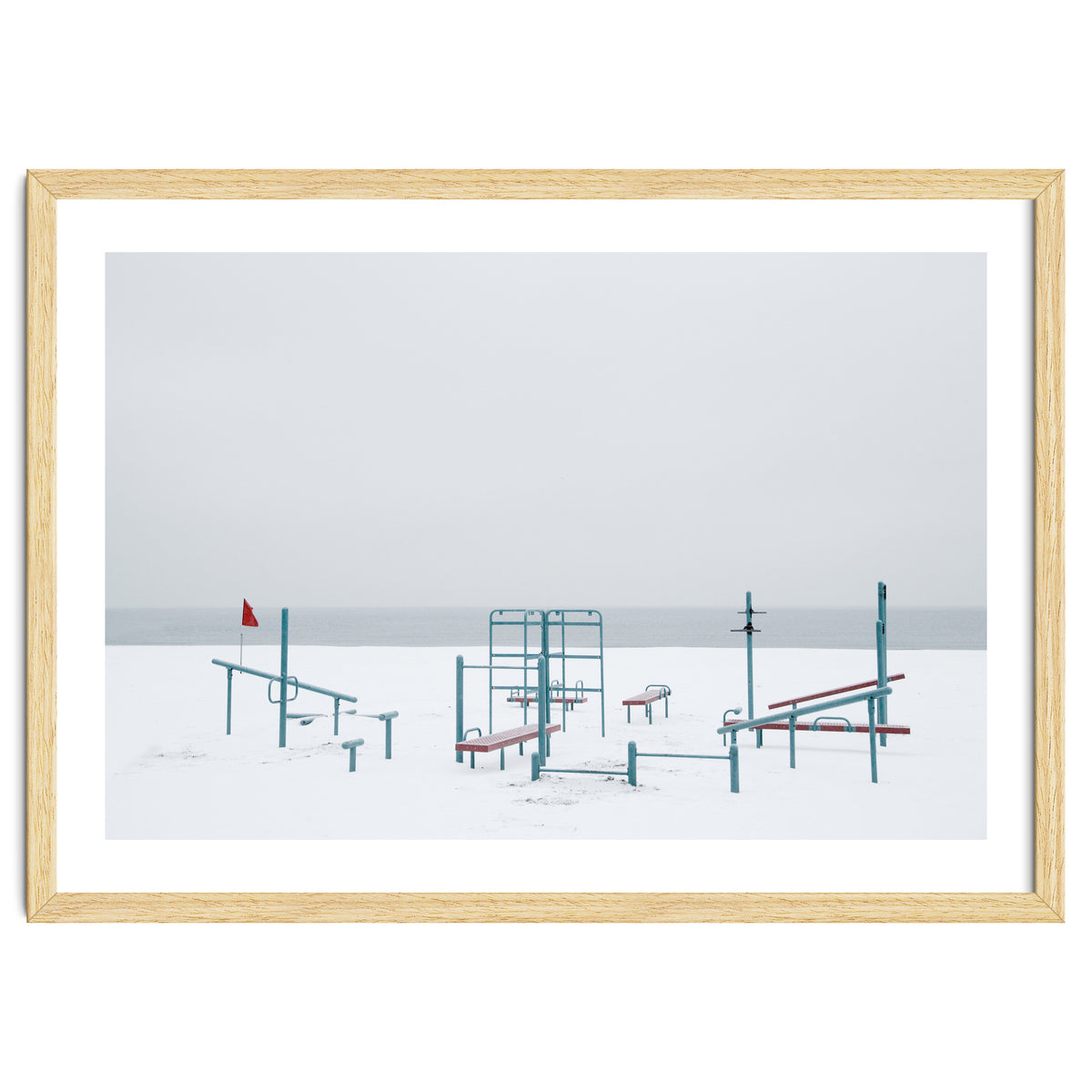 Playground in the winter snow beach