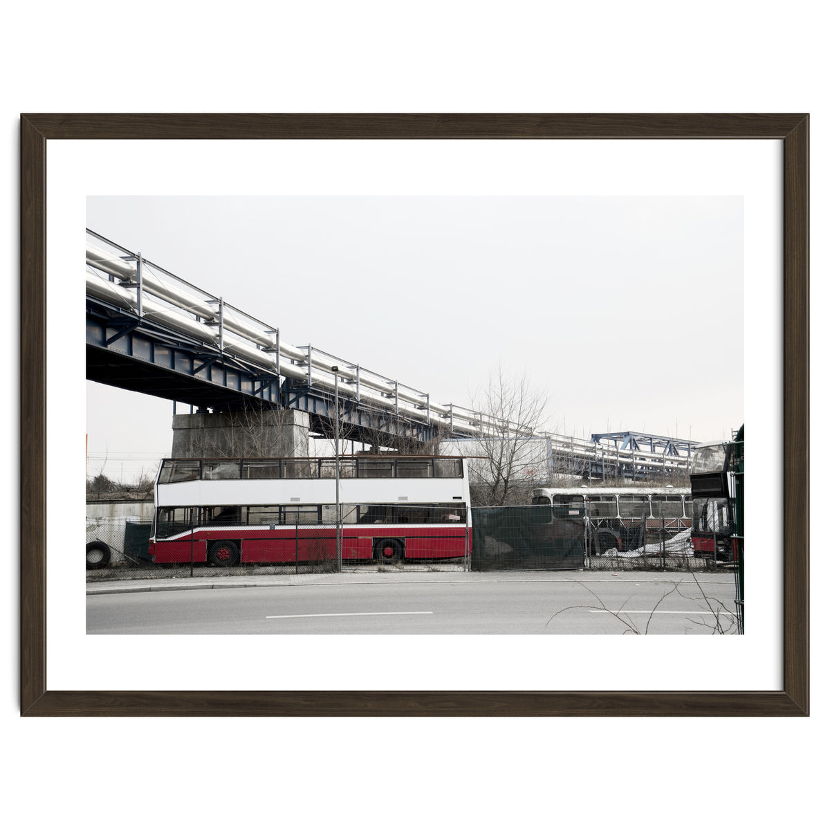 Abandoned Bus under the rail bridge