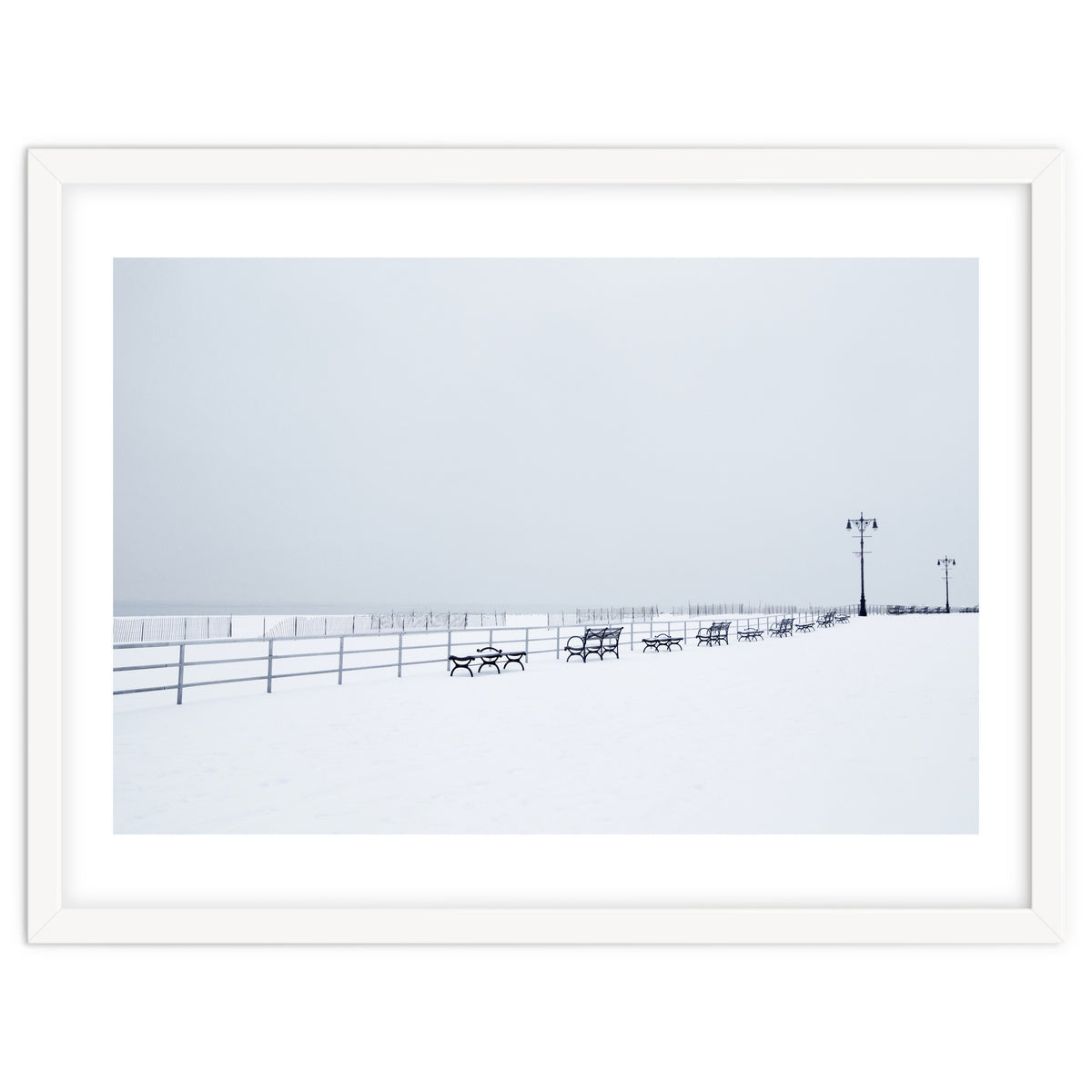 Benches along the pier on snow beach