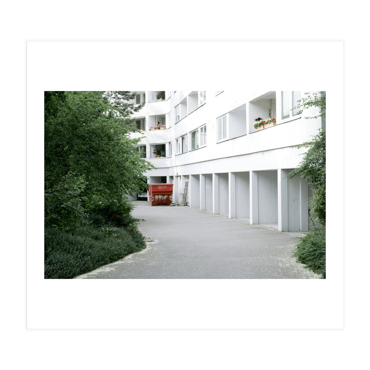 Red container in the residential site (Print Only)