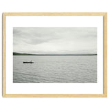 A boy pedaling the Board on the Lake - Iceland thumbnail