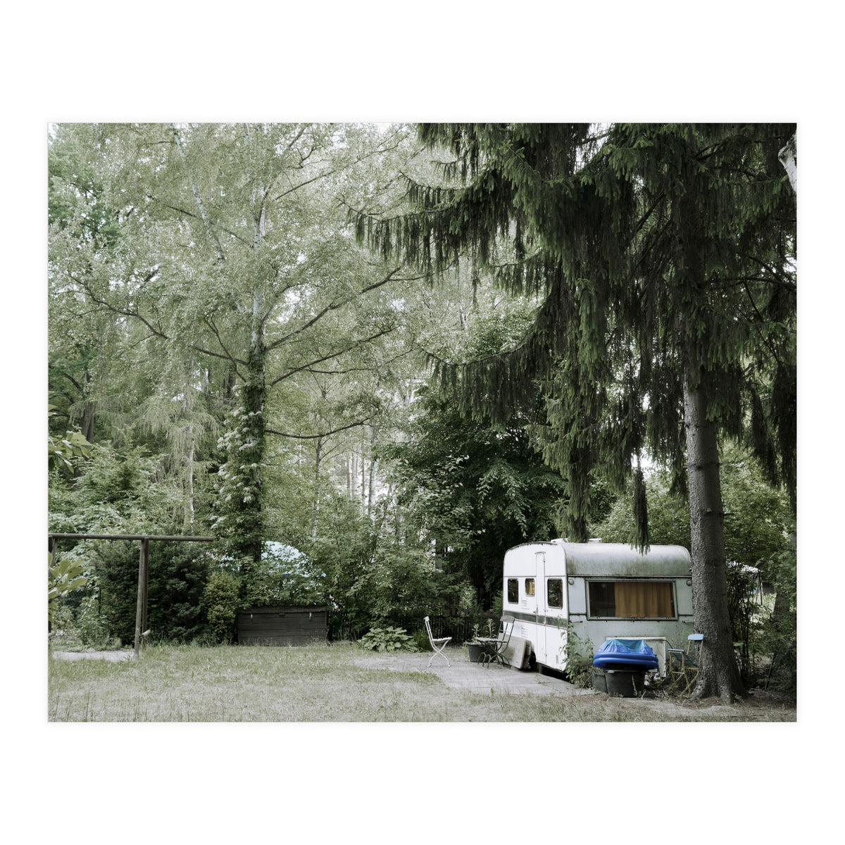 Travel trailer in the green garden (Print Only)