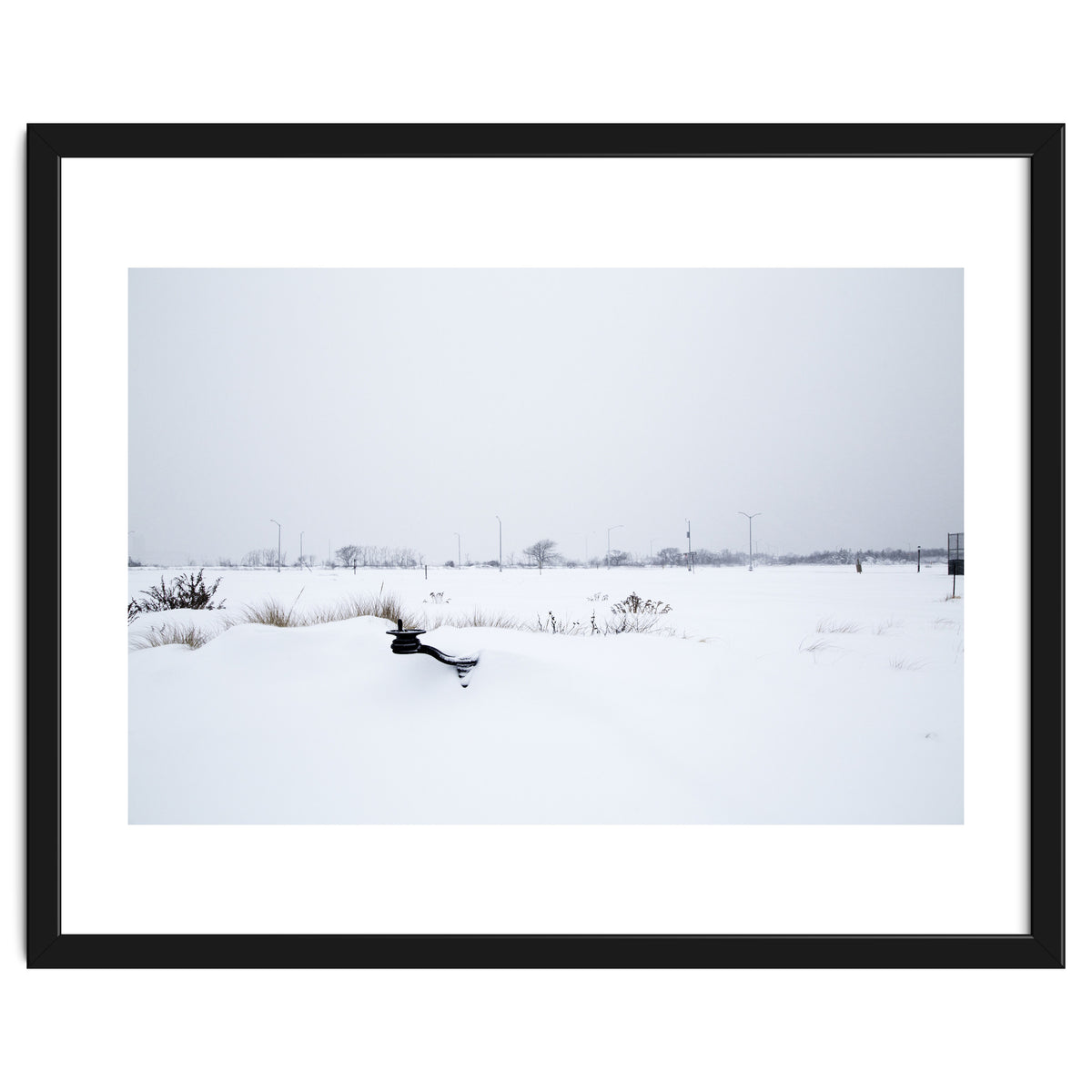 Drinking fountain covered with snow