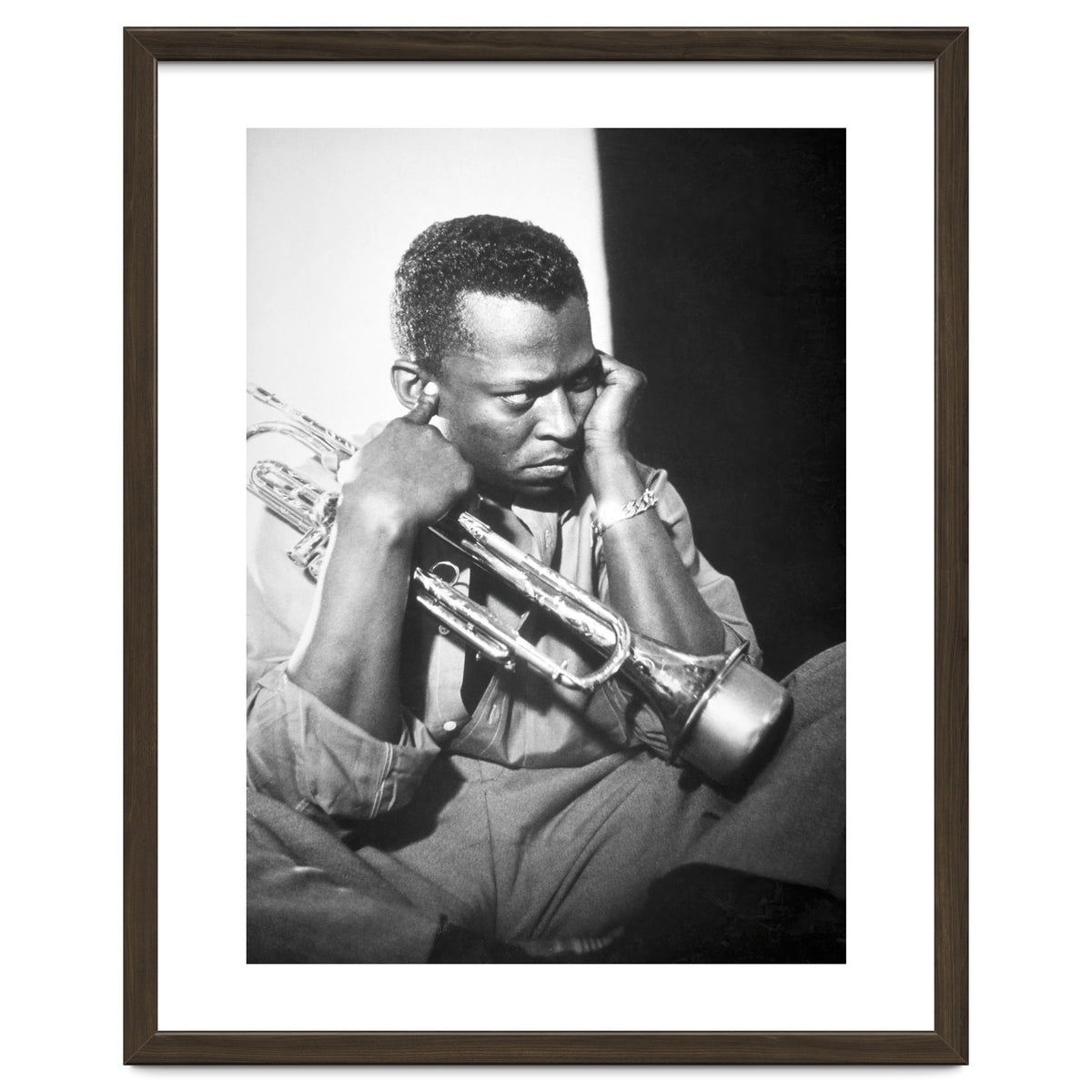 Jazz trumpeter Miles Davis early in his career playing in New York City, circa 1955.