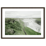Tourists walking along the waterfall - Iceland thumbnail