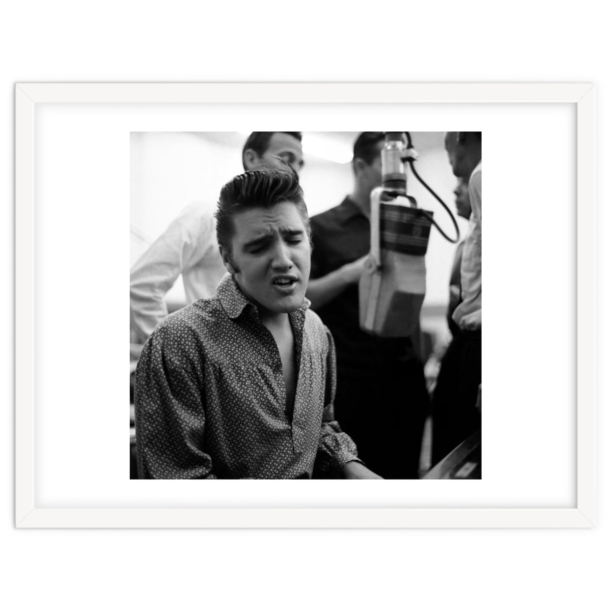 The American singer Elvis Presley during a recording session in 1956.