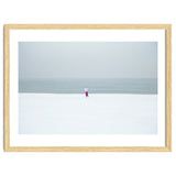 A walking woman in the winter snow beach thumbnail