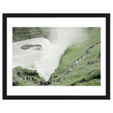 Tourists walking around the waterfall - Iceland thumbnail