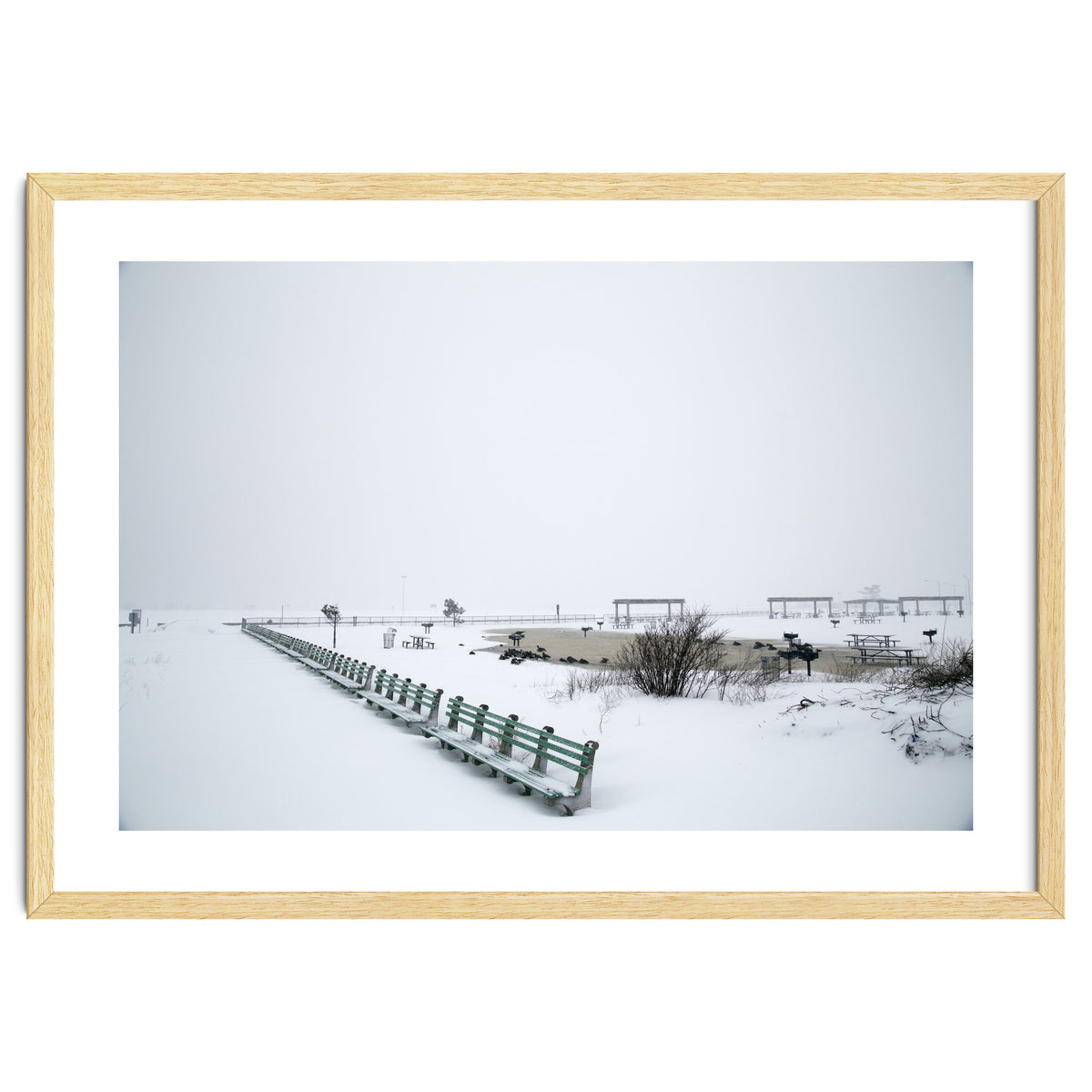No people on a bench in the snowy winter
