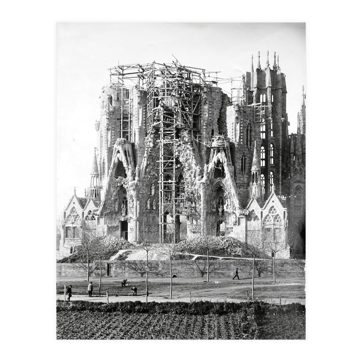 VIEW OF THE "SAGRADA FAMILIA" BASILICA BY ARCHITECT ANTONI GAUDI, PHOTOS OF WORK.  Ca. 1910. (Print Only)