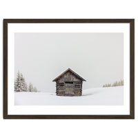 Wooden shed with snow