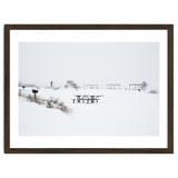 Tables and benches in a snow-covered park thumbnail