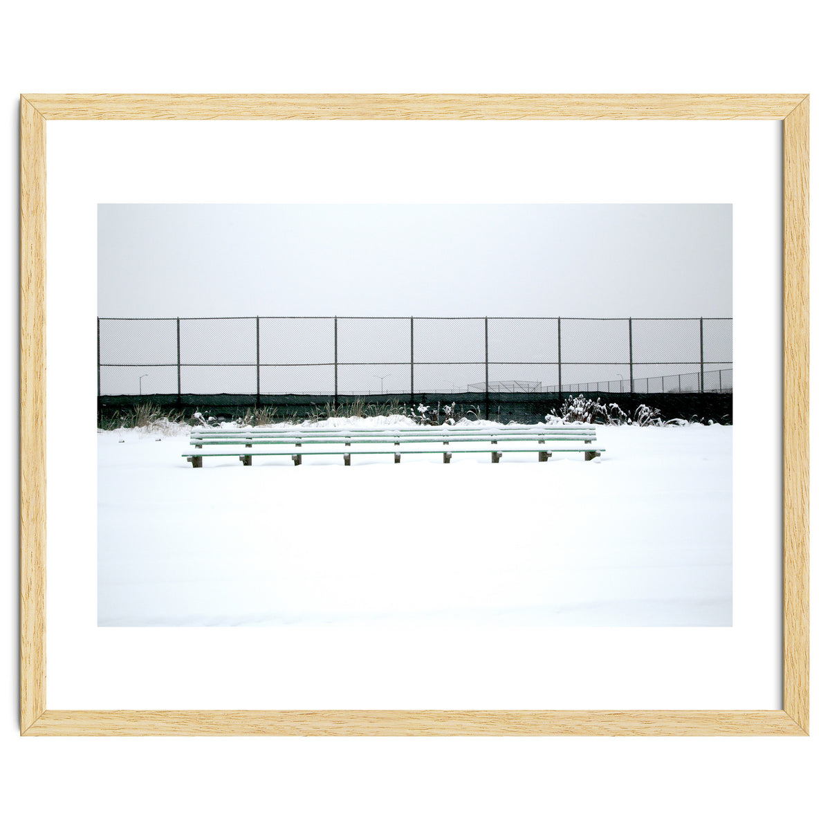 Bench with no people in snowy winter