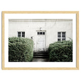 White door K between the green botanical gate thumbnail