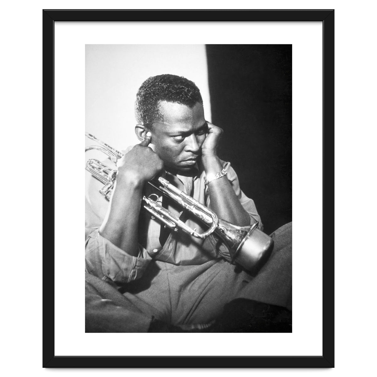 Jazz trumpeter Miles Davis early in his career playing in New York City, circa 1955.