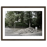 Piled-up rocks under construction on the street