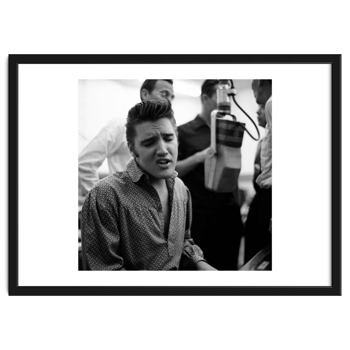 The American singer Elvis Presley during a recording session in 1956.