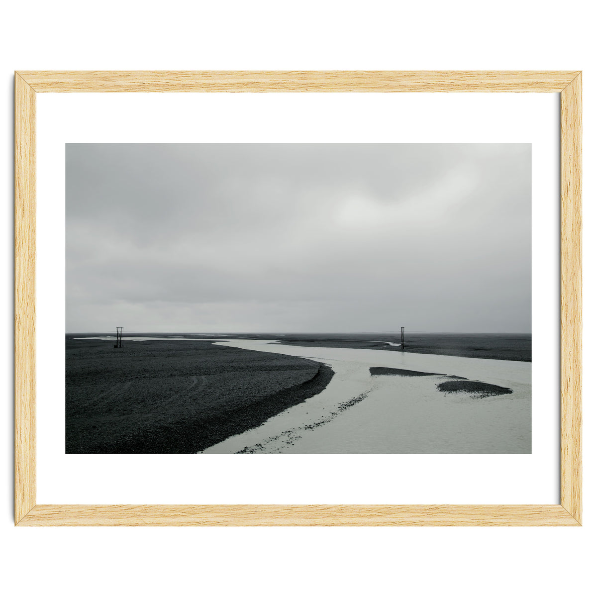 River passing through a black volcanic road - Iceland