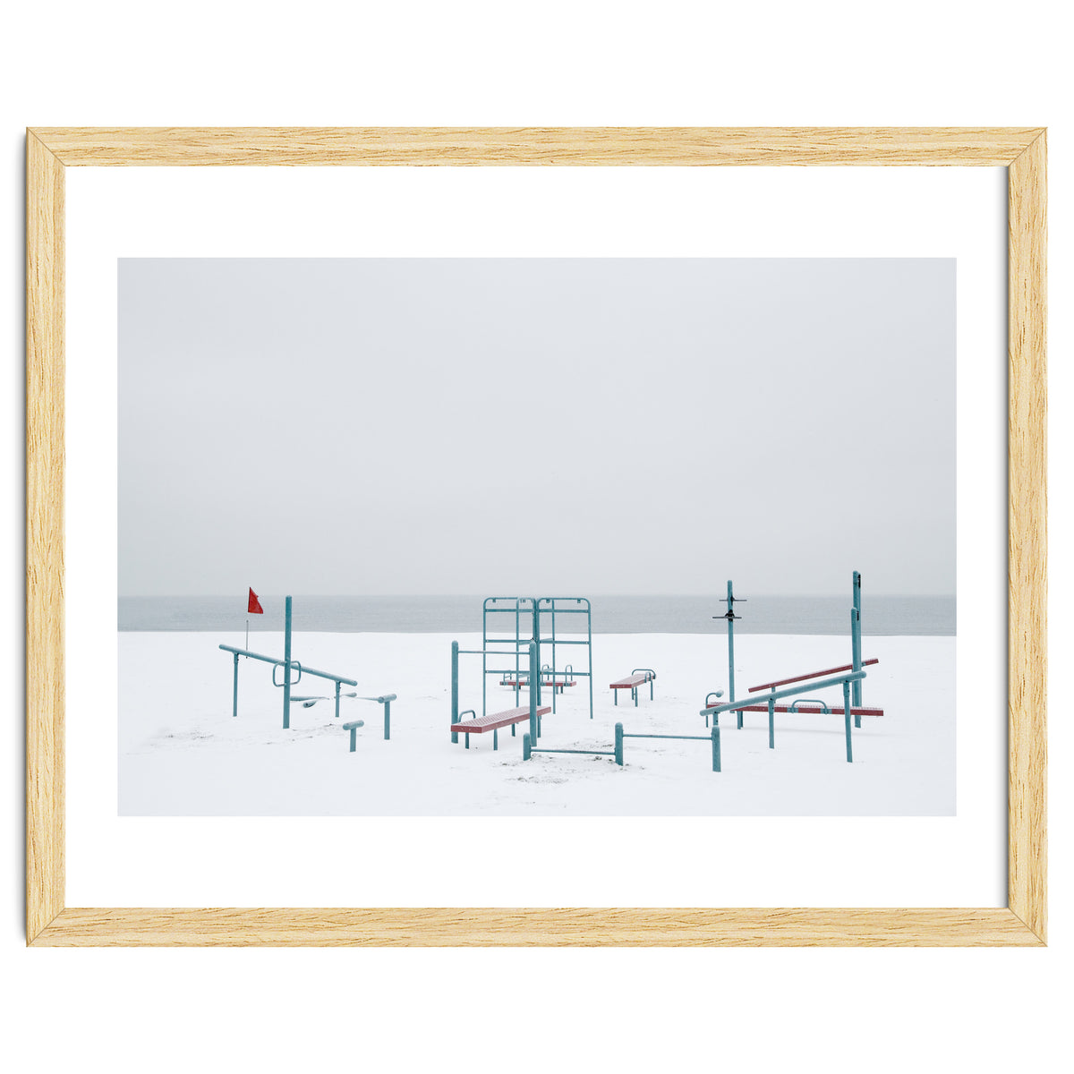 Playground in the winter snow beach