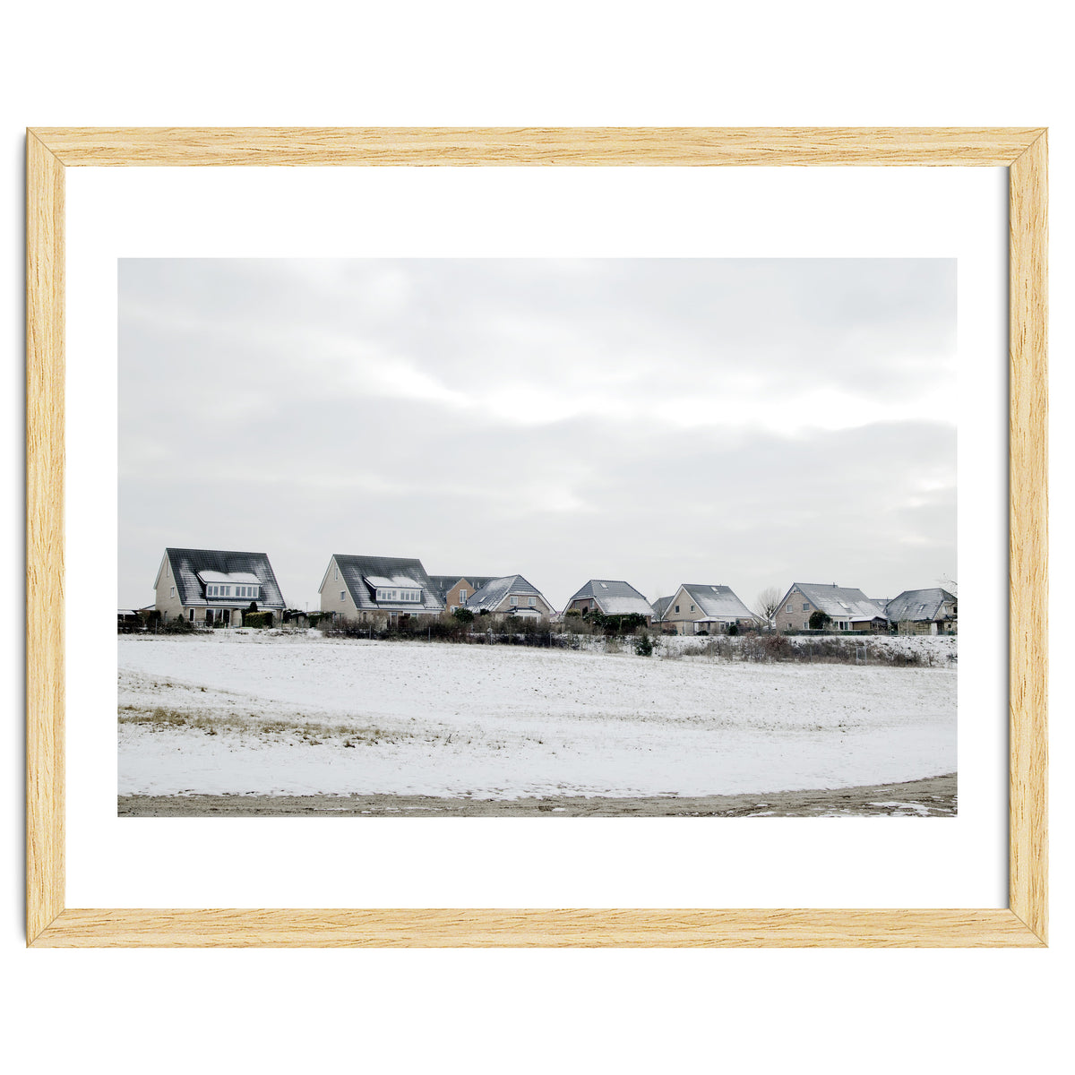 Snow covered houses on the hill