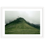 Green mountain covered in clouds - Iceland thumbnail