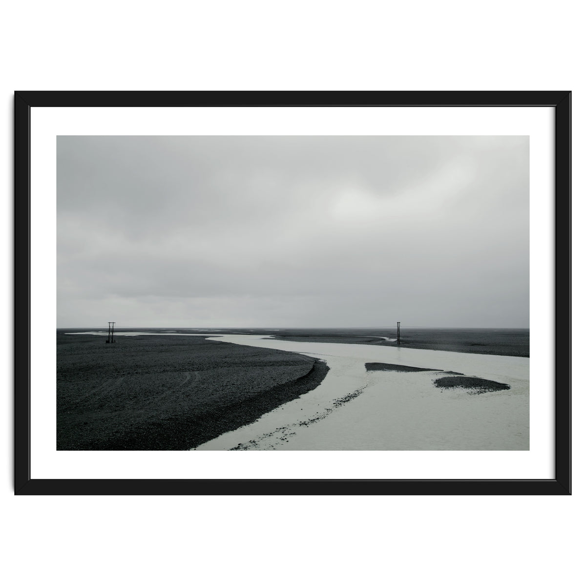 River passing through a black volcanic road - Iceland