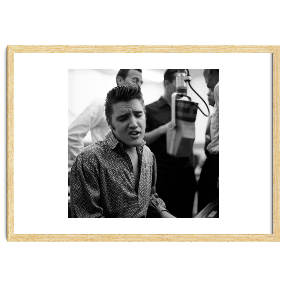 The American singer Elvis Presley during a recording session in 1956.