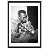 Jazz trumpeter Miles Davis early in his career playing in New York City, circa 1955. thumbnail
