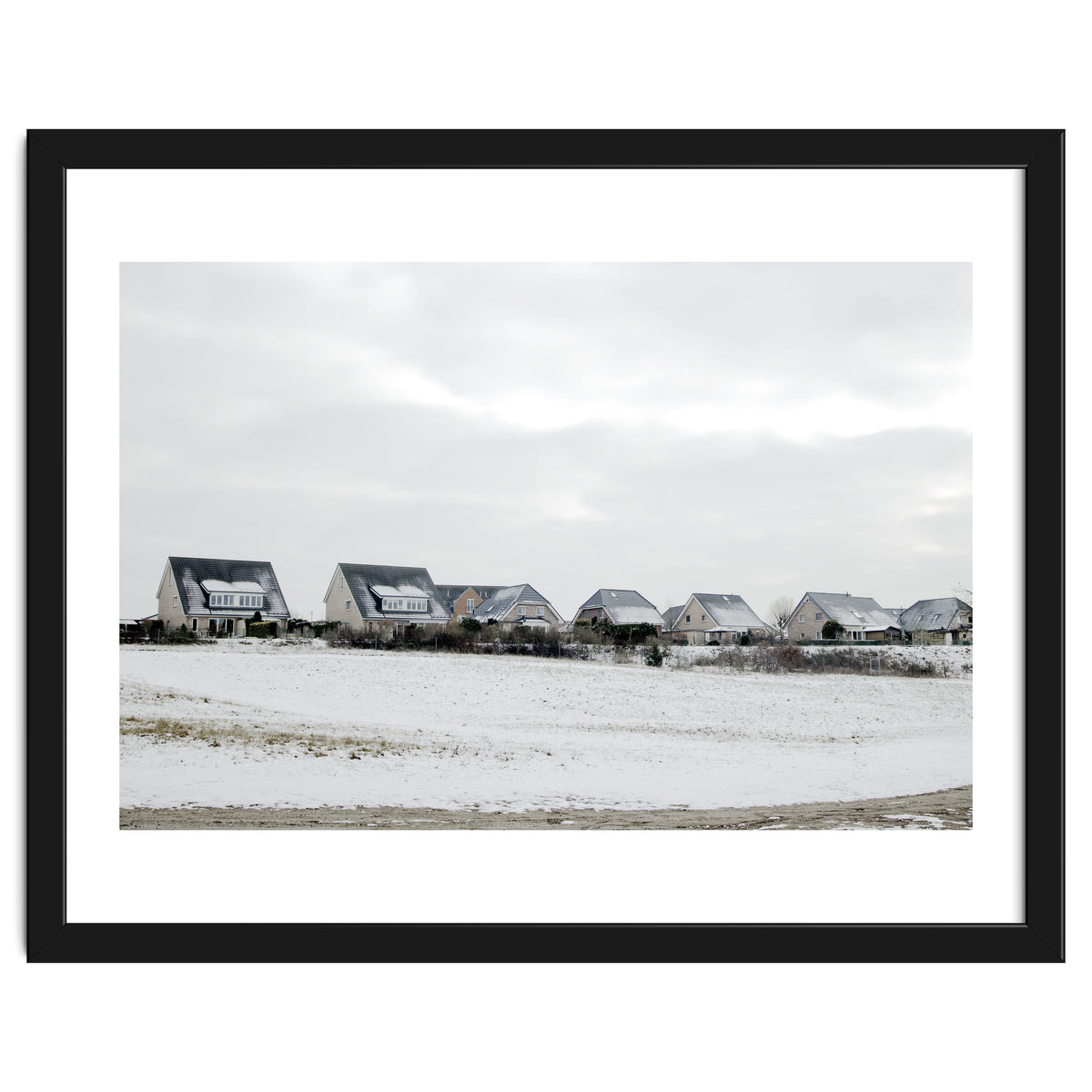 Snow covered houses on the hill