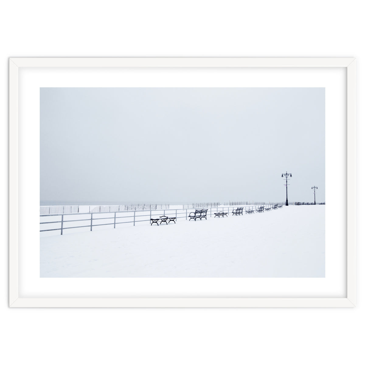 Benches along the pier on snow beach