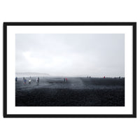 Tourists on the black sand beach - Iceland