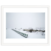 No people on a bench in the snowy winter