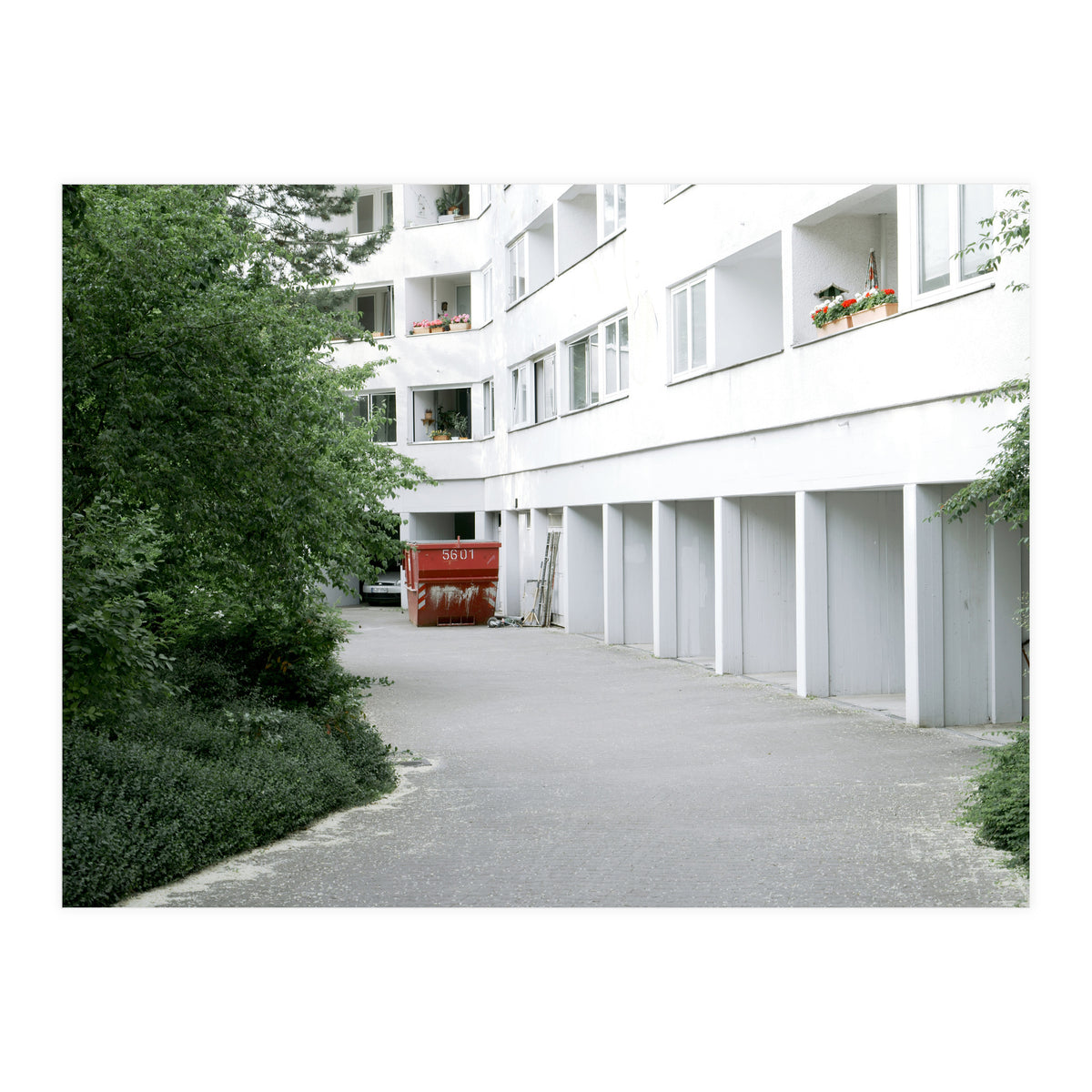 Red container in the residential site (Print Only)