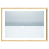 A walking woman in the winter snow beach thumbnail