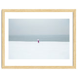 A walking woman in the winter snow beach thumbnail
