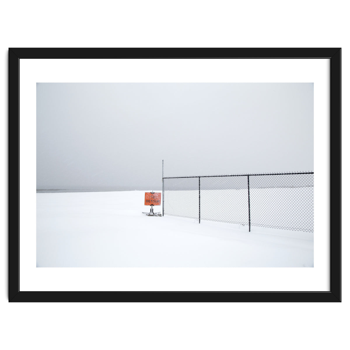 Detour sign in the snow beach