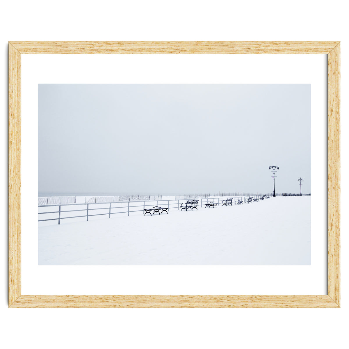 Benches along the pier on snow beach