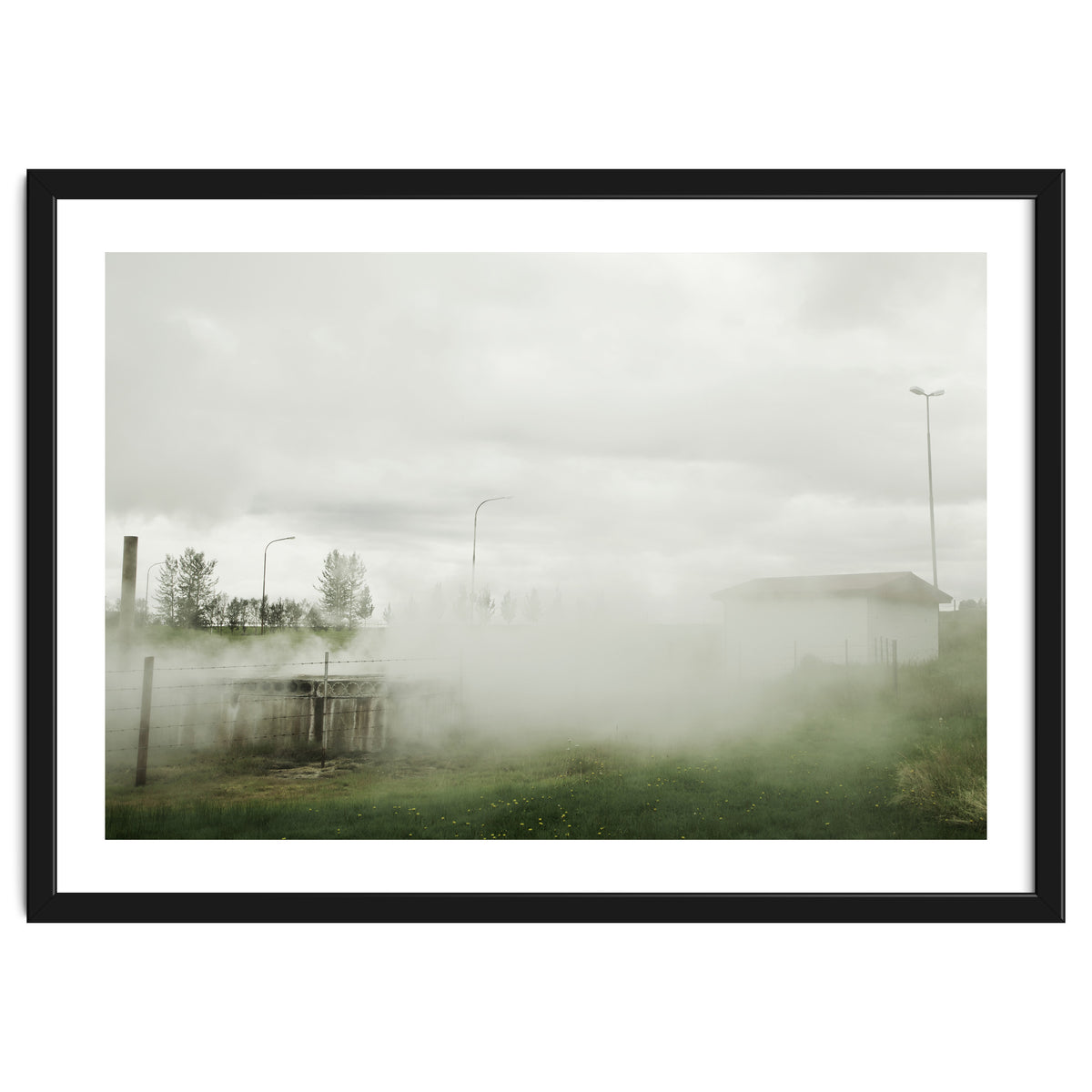 A source covered in steam from a hot spring - Iceland