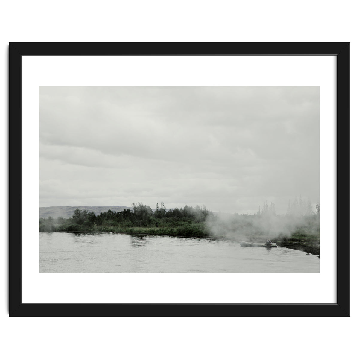 A boy on the boat in the geothermal lake - Iceland