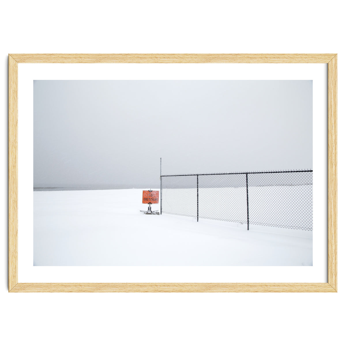 Detour sign in the snow beach