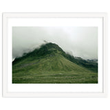 Green mountain covered in clouds - Iceland thumbnail