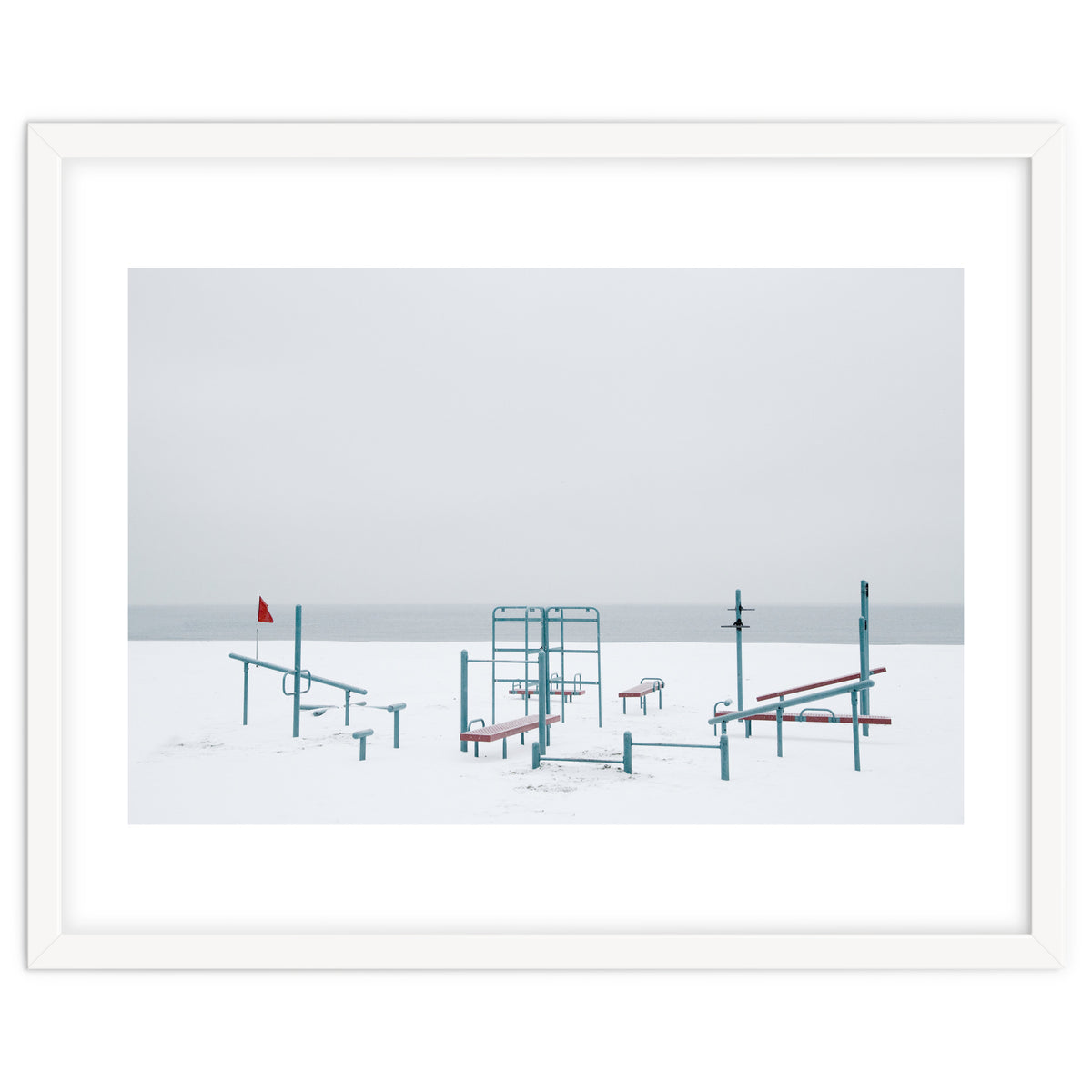 Playground in the winter snow beach