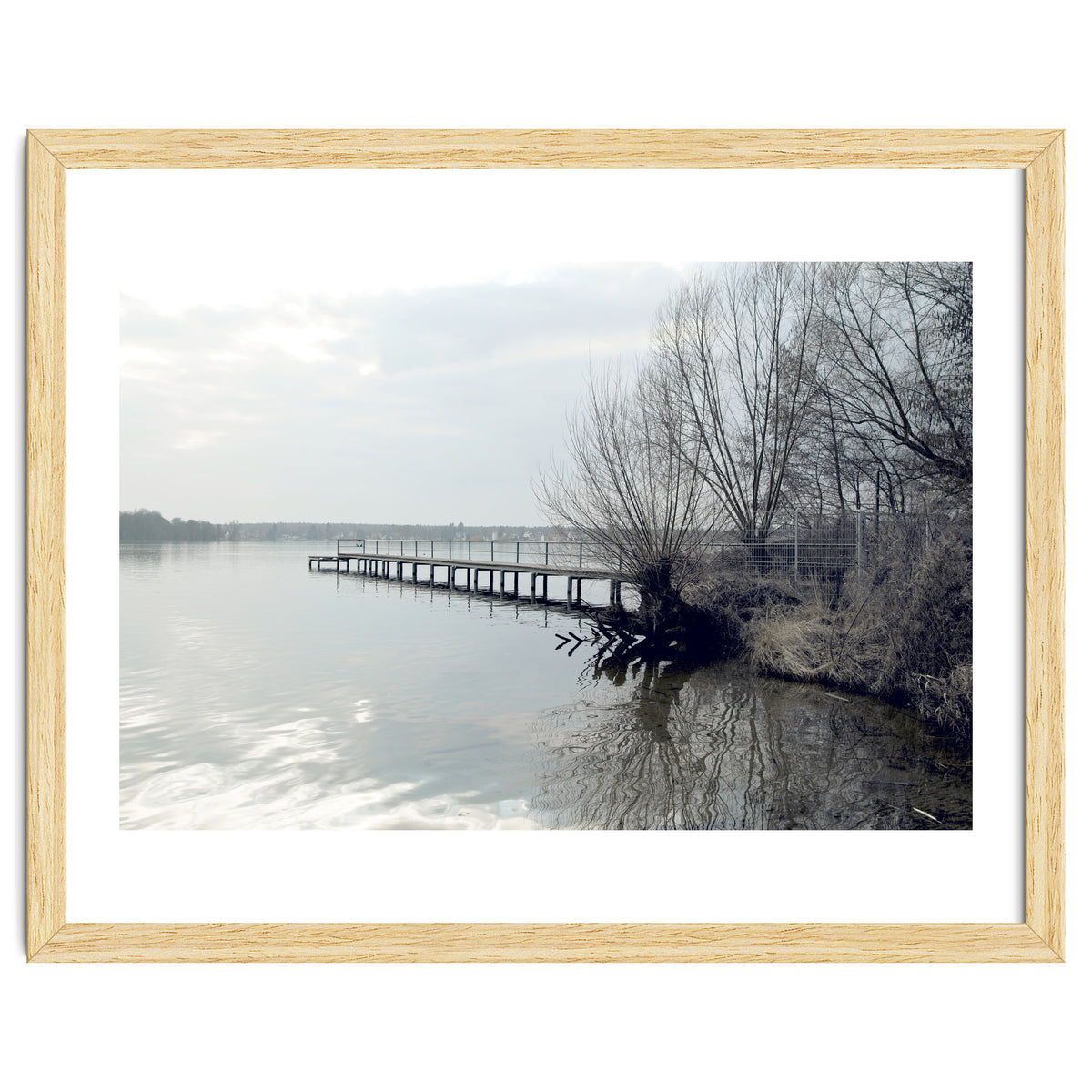 Sunny day pier in the lake