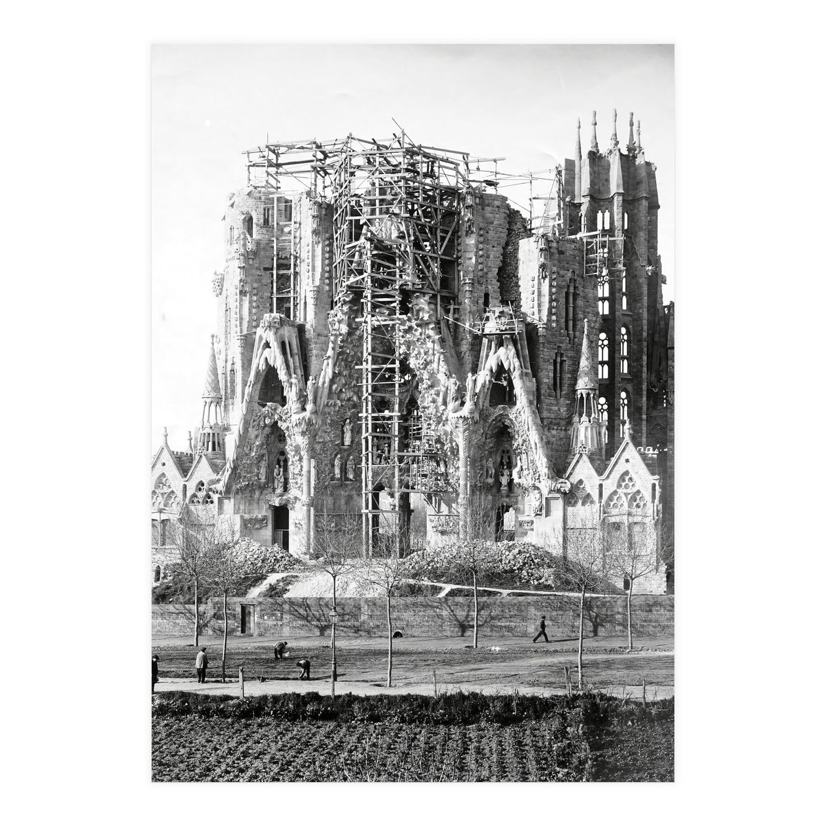 VIEW OF THE "SAGRADA FAMILIA" BASILICA BY ARCHITECT ANTONI GAUDI, PHOTOS OF WORK.  Ca. 1910. (Print Only)